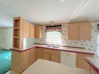 181 Wild Oak Road Southeast Cleveland, TN 37323 - Photo 3 of 12 a kitchen with granite countertop a sink stainless steel appliances white cabinets and a window