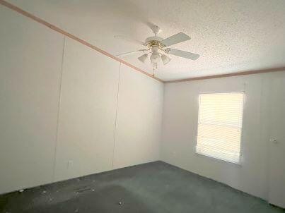181 Wild Oak Road Southeast Cleveland, TN 37323 - Photo 9 of 12 an empty room with a window and a fan