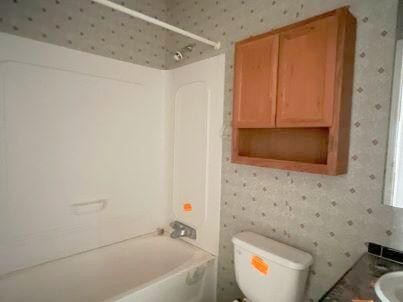 181 Wild Oak Road Southeast Cleveland, TN 37323 - Photo 10 of 12 a bathroom with a bathtub and a sink