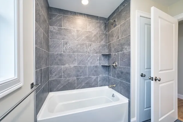 a bathroom with a bathtub