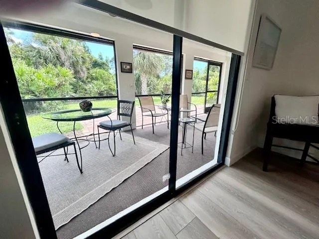 a view of a room with a large window