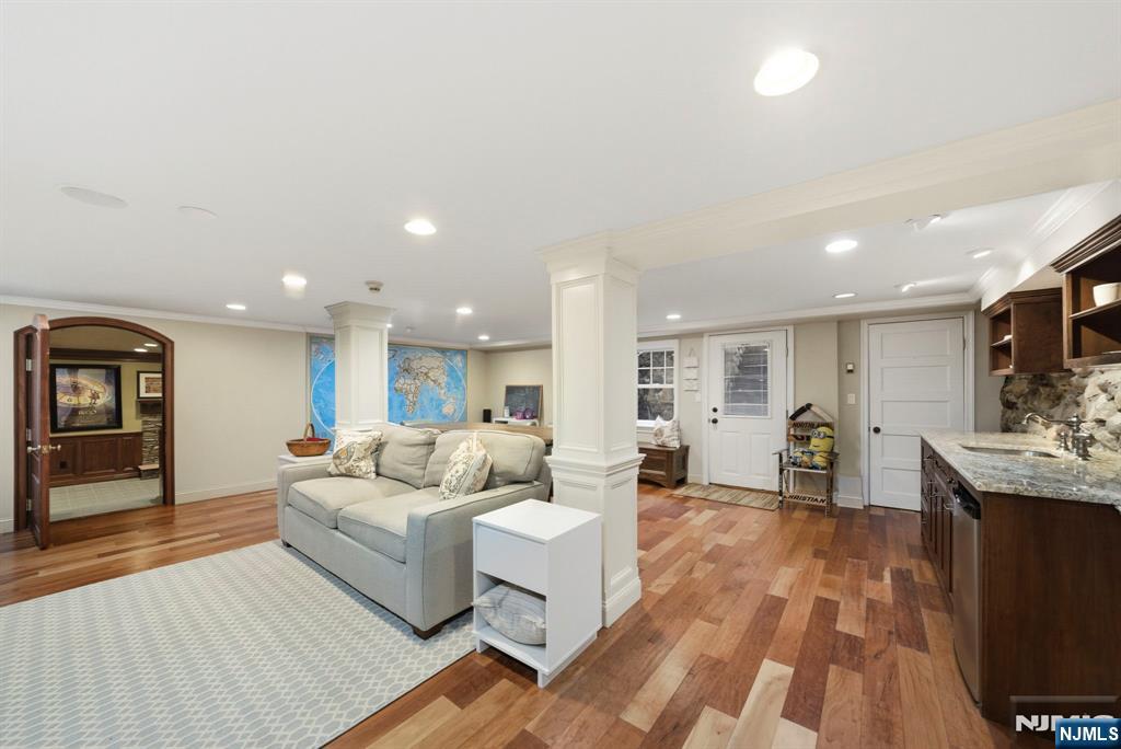 203 Heights Road Ridgewood, NJ 07450 - Photo 31 of 41 a living room with furniture and a wooden floor