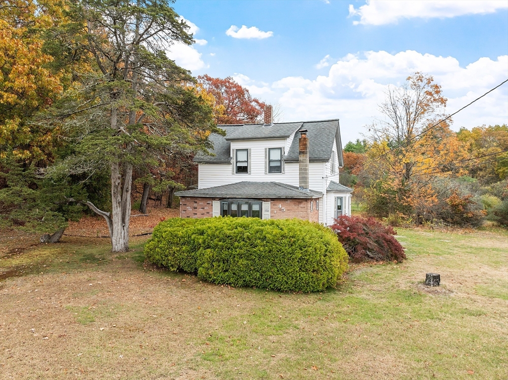 45 Clark Road Shirley, MA 01464 - Photo 1 of 33 a view of a house with a yard