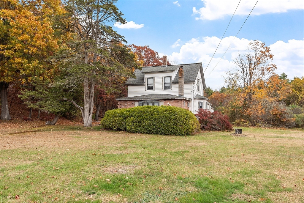 45 Clark Road Shirley, MA 01464 - Photo 2 of 33 a view of a house with a big yard