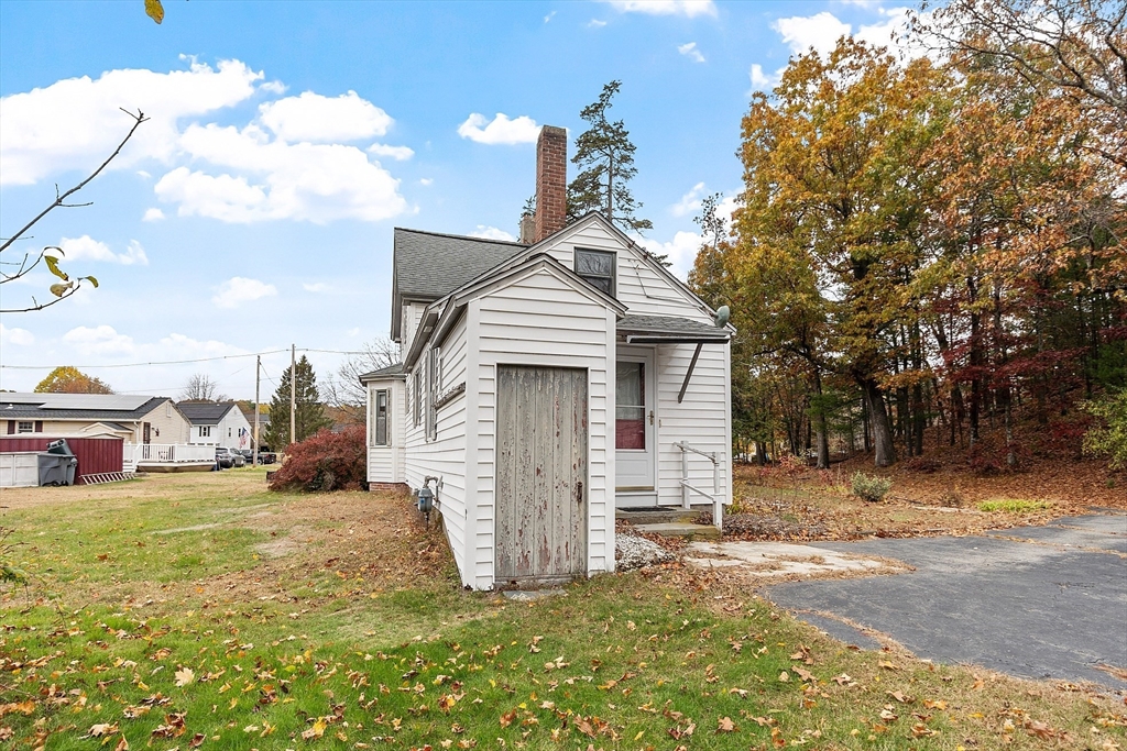 45 Clark Road Shirley, MA 01464 - Photo 5 of 33 a view of a house with a yard