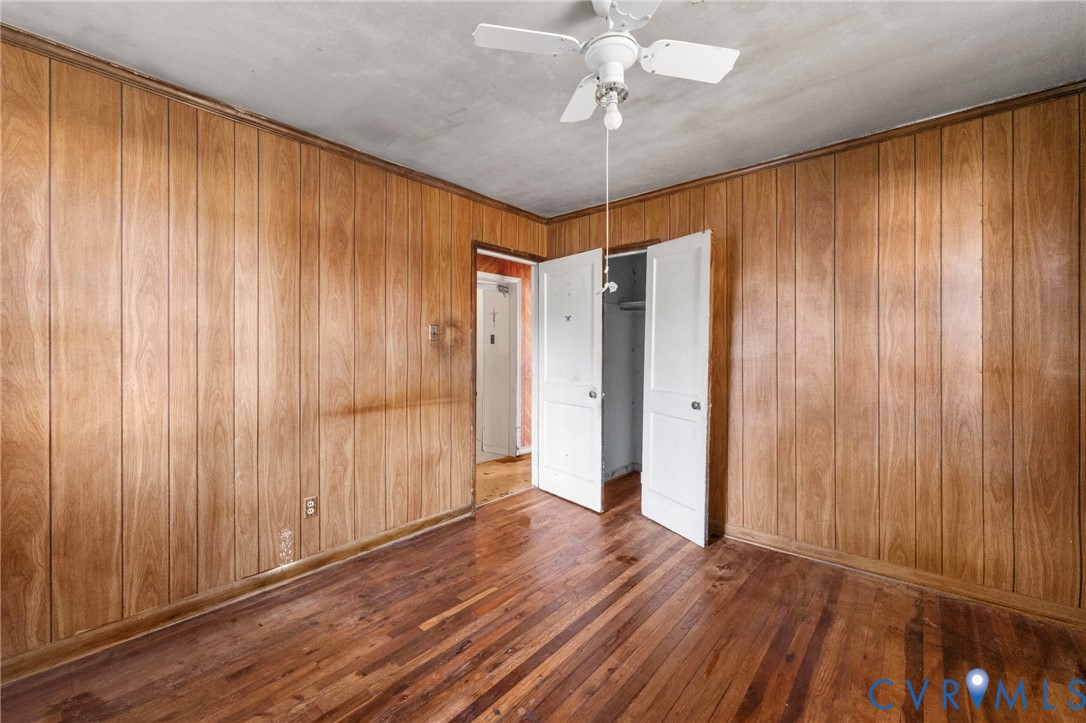 2925 West Strathmore Road Richmond, VA 23237 - Photo 14 of 25 a view of a room with wooden floor and staircase