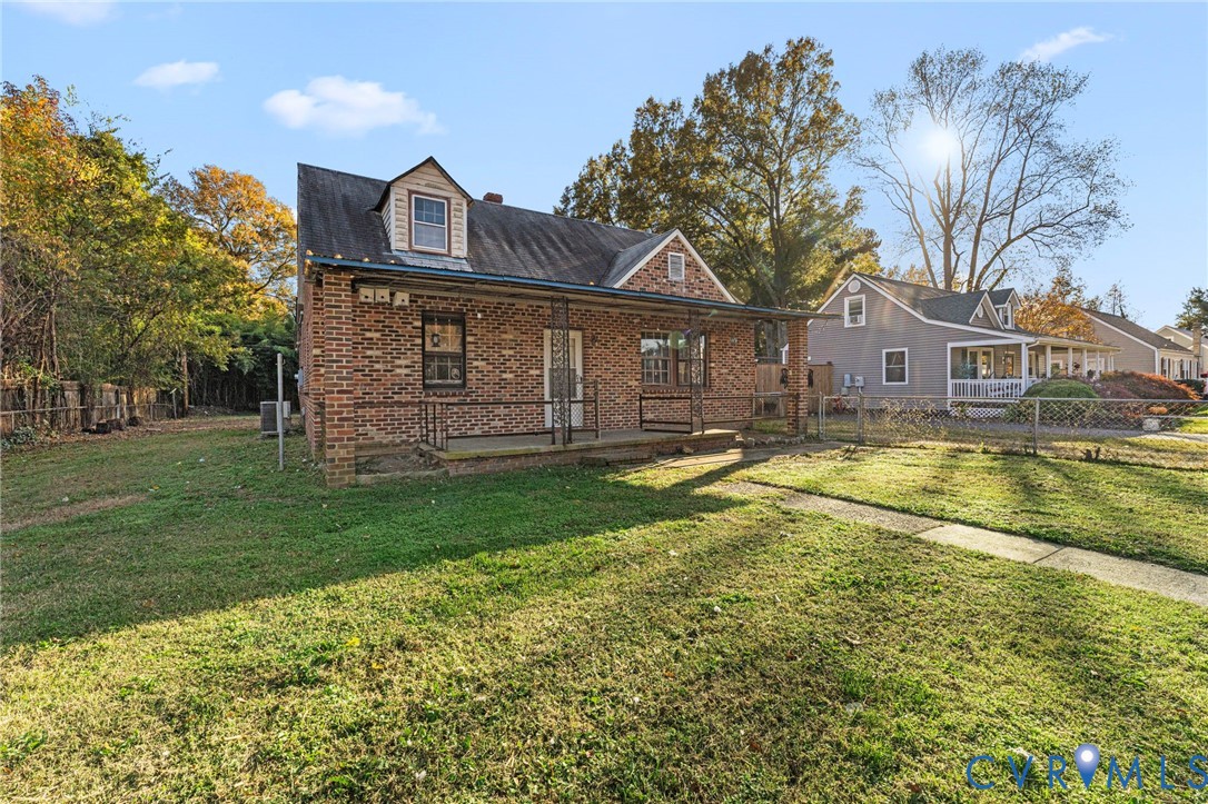 2925 West Strathmore Road Richmond, VA 23237 - Photo 22 of 25 a view of a house with a big yard and large trees