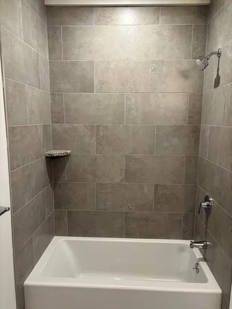 a bathroom with a bathtub