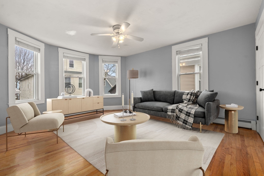 8 Haverford Street Boston, MA 02130 - Photo 12 of 34 a living room with furniture and a large window