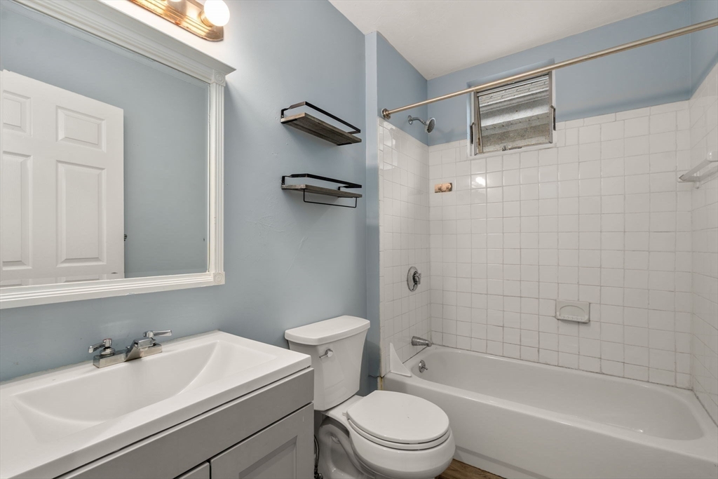 8 Haverford Street Boston, MA 02130 - Photo 20 of 34 a bathroom with a sink toilet and shower