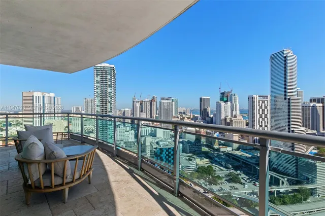 a view of a balcony with city view