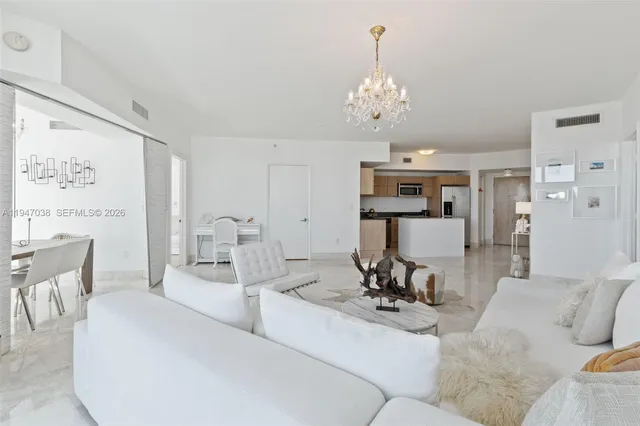 a view of a dining room with furniture and window