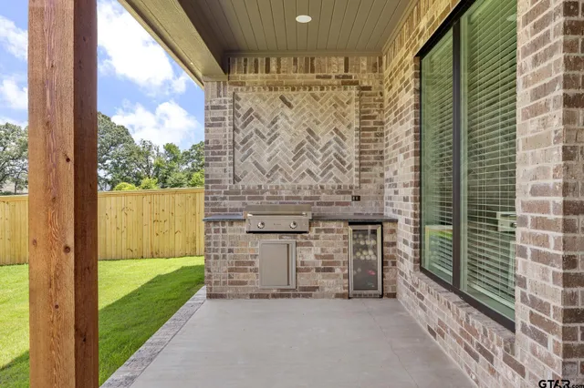 a view of a porch with a door and a porch