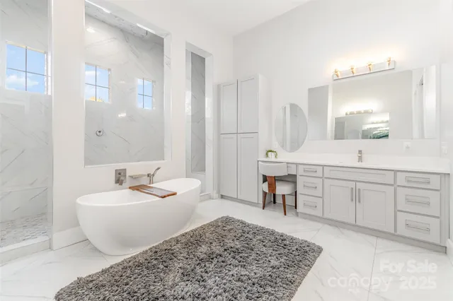 a bathroom with a double vanity sink and a mirror