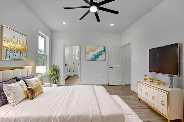 a bathroom with double vanity sink and a mirror