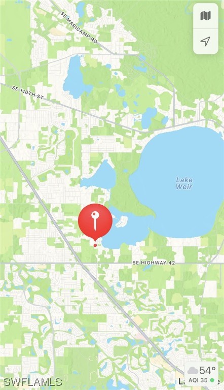 8020 Southeast Sunset Harbor Road Summerfield, FL 34491 - Photo 1 of 2 a view of a swimming pool