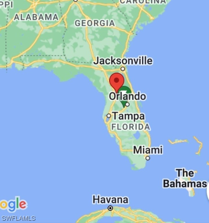 8020 Southeast Sunset Harbor Road Summerfield, FL 34491 - Photo 2 of 2 a close up of a sign