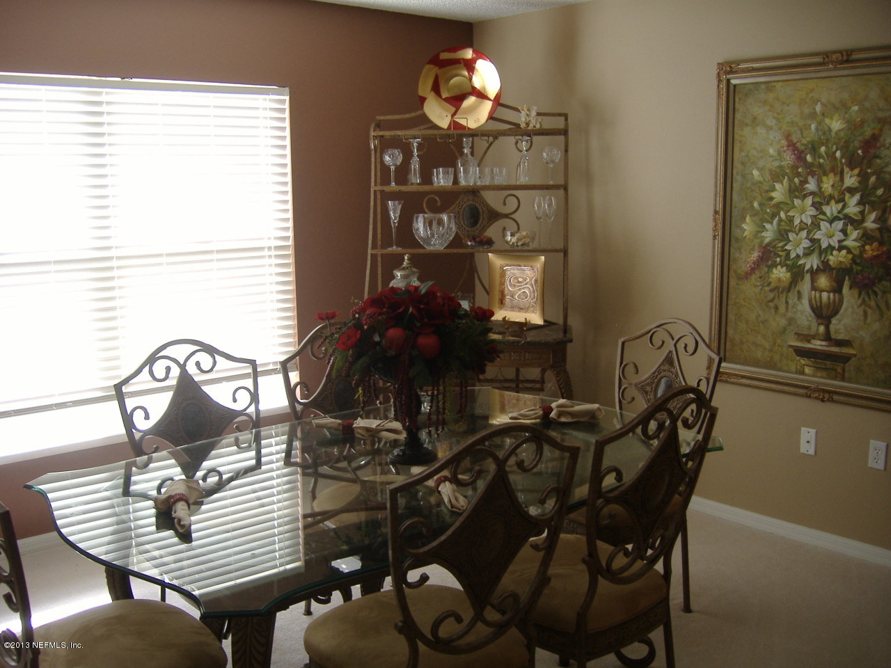12276 Hickory Forest Road Jacksonville, FL 32226 - Photo 12 of 15 a view of a dining room with furniture and chandelier