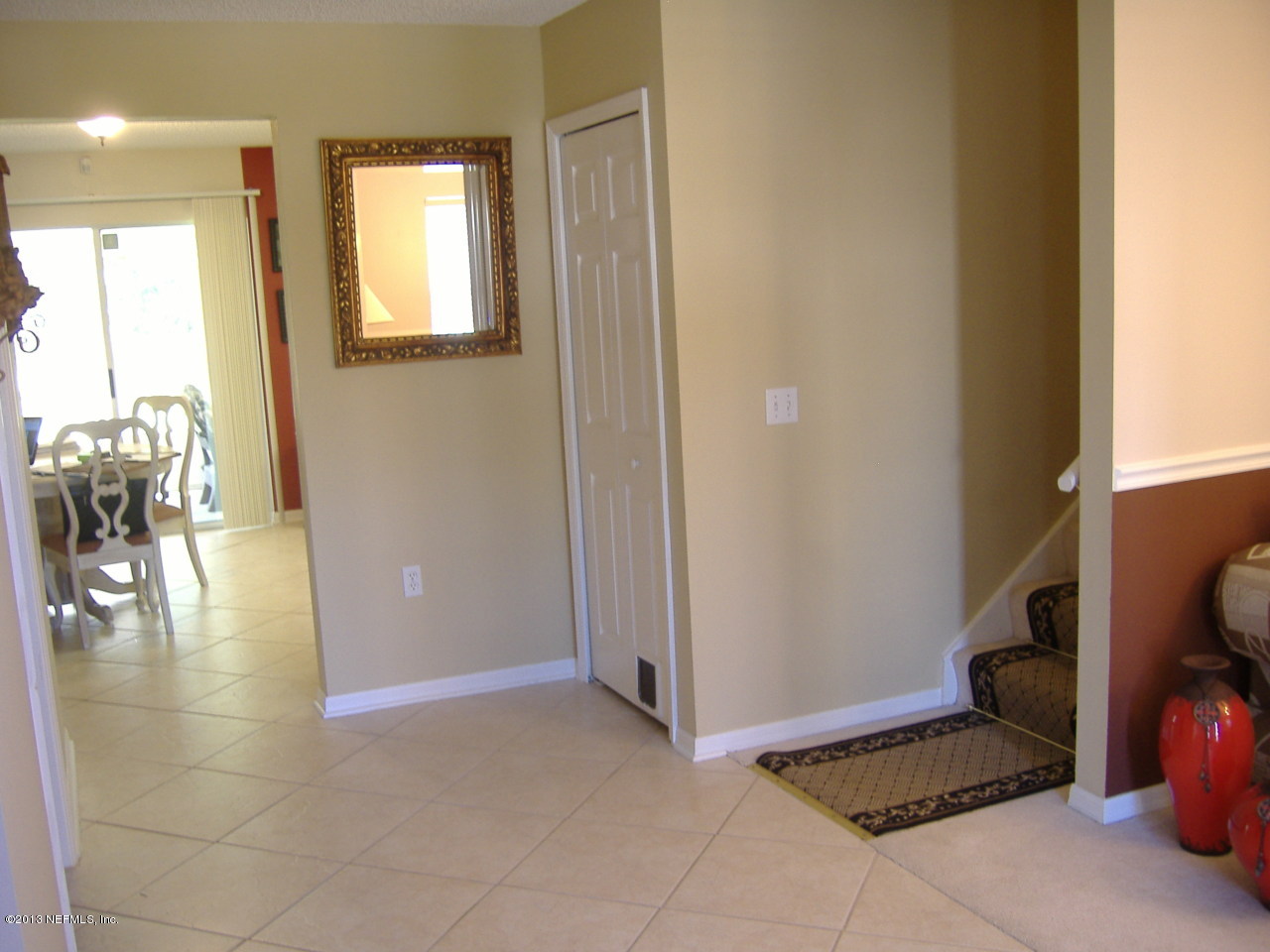 12276 Hickory Forest Road Jacksonville, FL 32226 - Photo 14 of 15 a view of an entryway with wooden floor