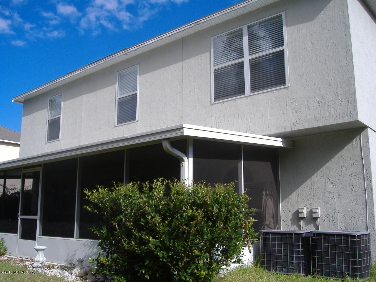 12276 Hickory Forest Road Jacksonville, FL 32226 - Photo 3 of 15 a front view of a house with plants