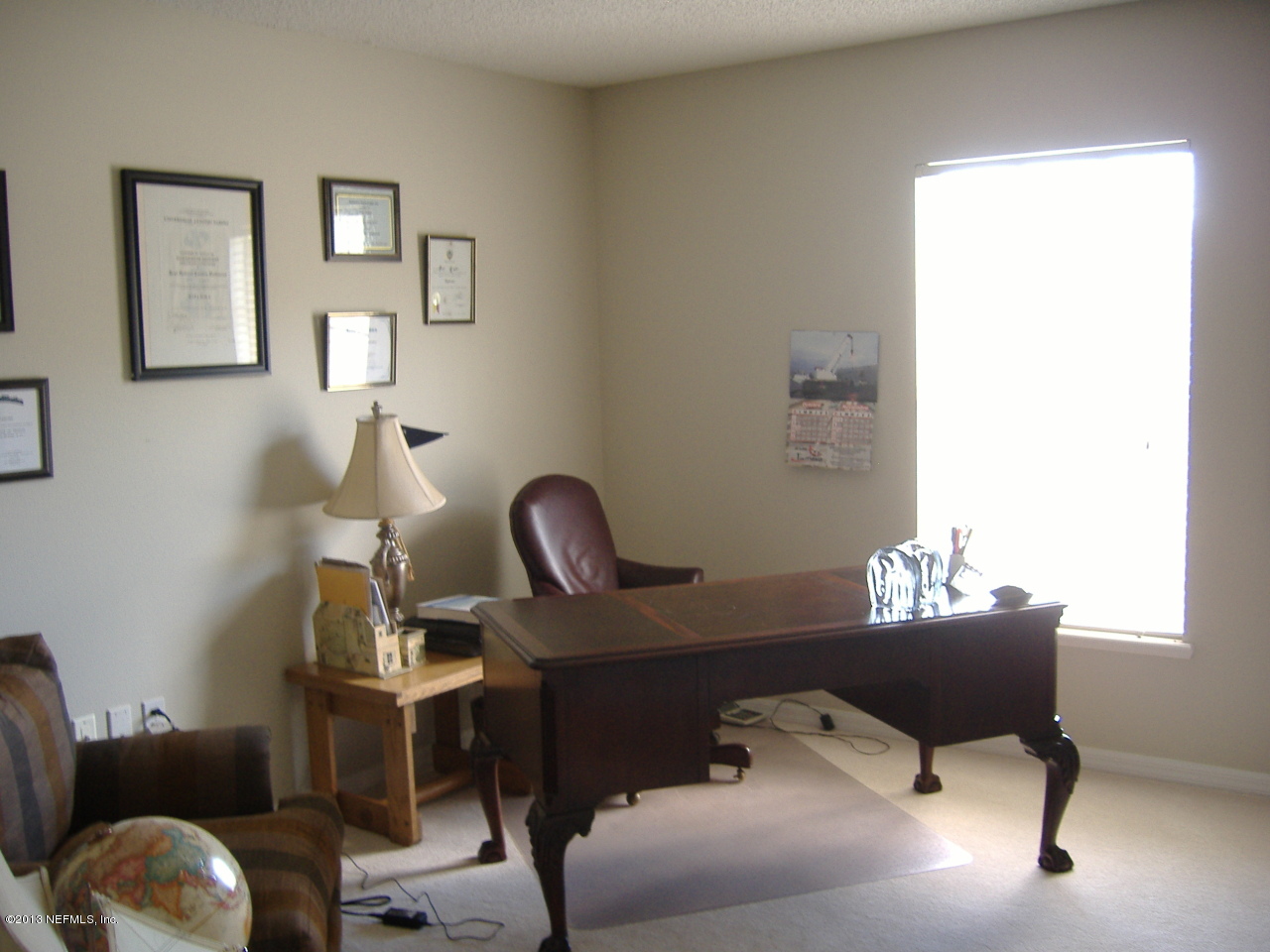 12276 Hickory Forest Road Jacksonville, FL 32226 - Photo 5 of 15 a room with a workspace