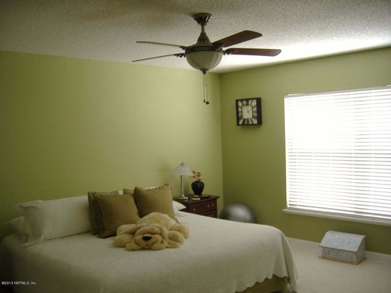 12276 Hickory Forest Road Jacksonville, FL 32226 - Photo 7 of 15 a bed room with a bed and a window