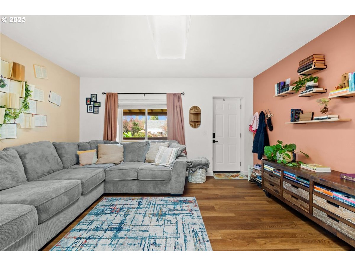 1720 B Street Forest Grove, OR 97116 - Photo 13 of 38 a living room with furniture windows and wooden floor