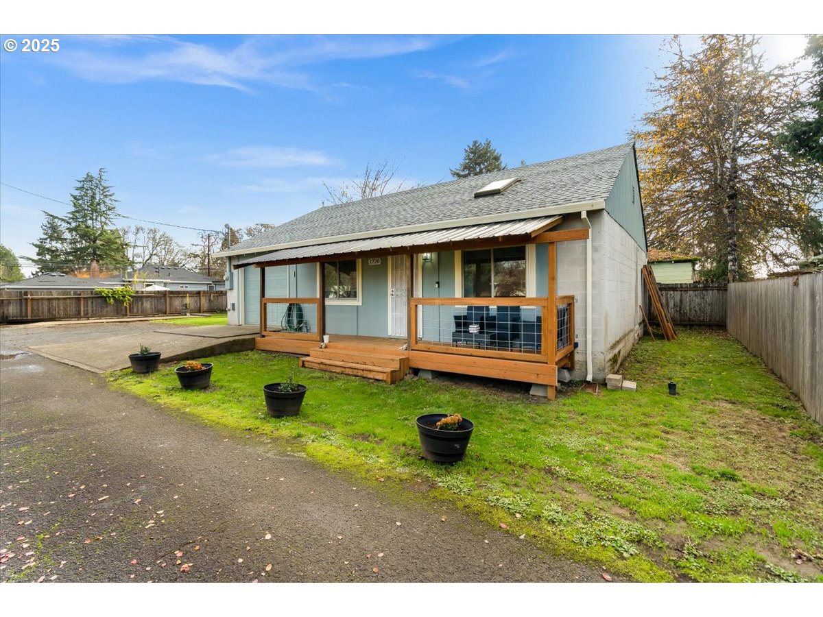 1720 B Street Forest Grove, OR 97116 - Photo 2 of 38 a front view of a house with garden