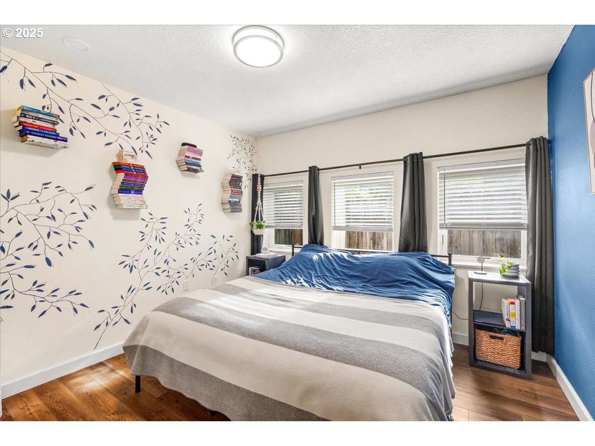1720 B Street Forest Grove, OR 97116 - Photo 22 of 38 a bedroom with a bed and a window with rug