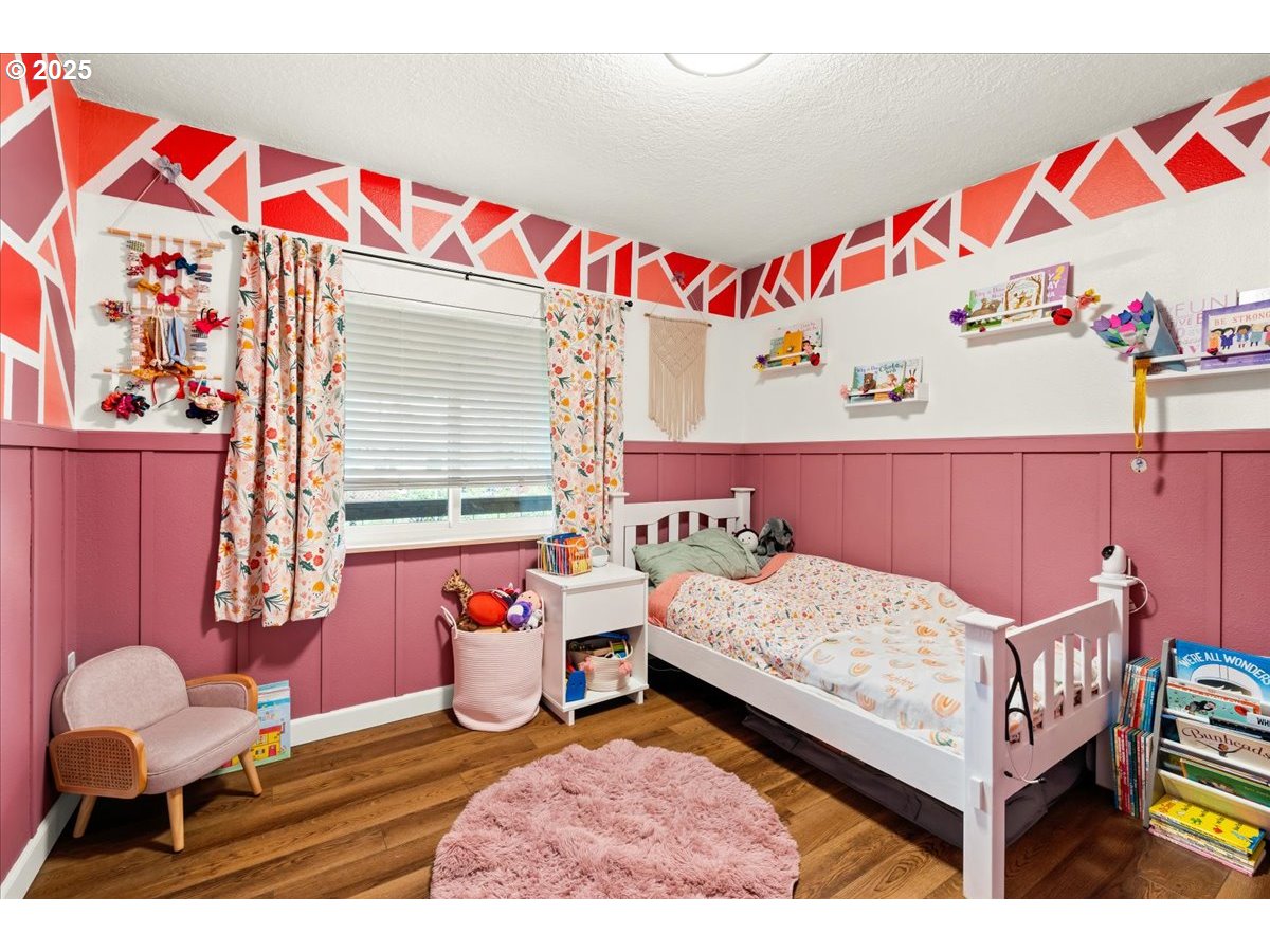 1720 B Street Forest Grove, OR 97116 - Photo 23 of 38 a bedroom with a bed and a window