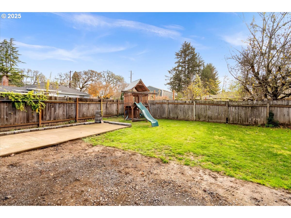 1720 B Street Forest Grove, OR 97116 - Photo 26 of 38 a swimming pool with outdoor seating and garden
