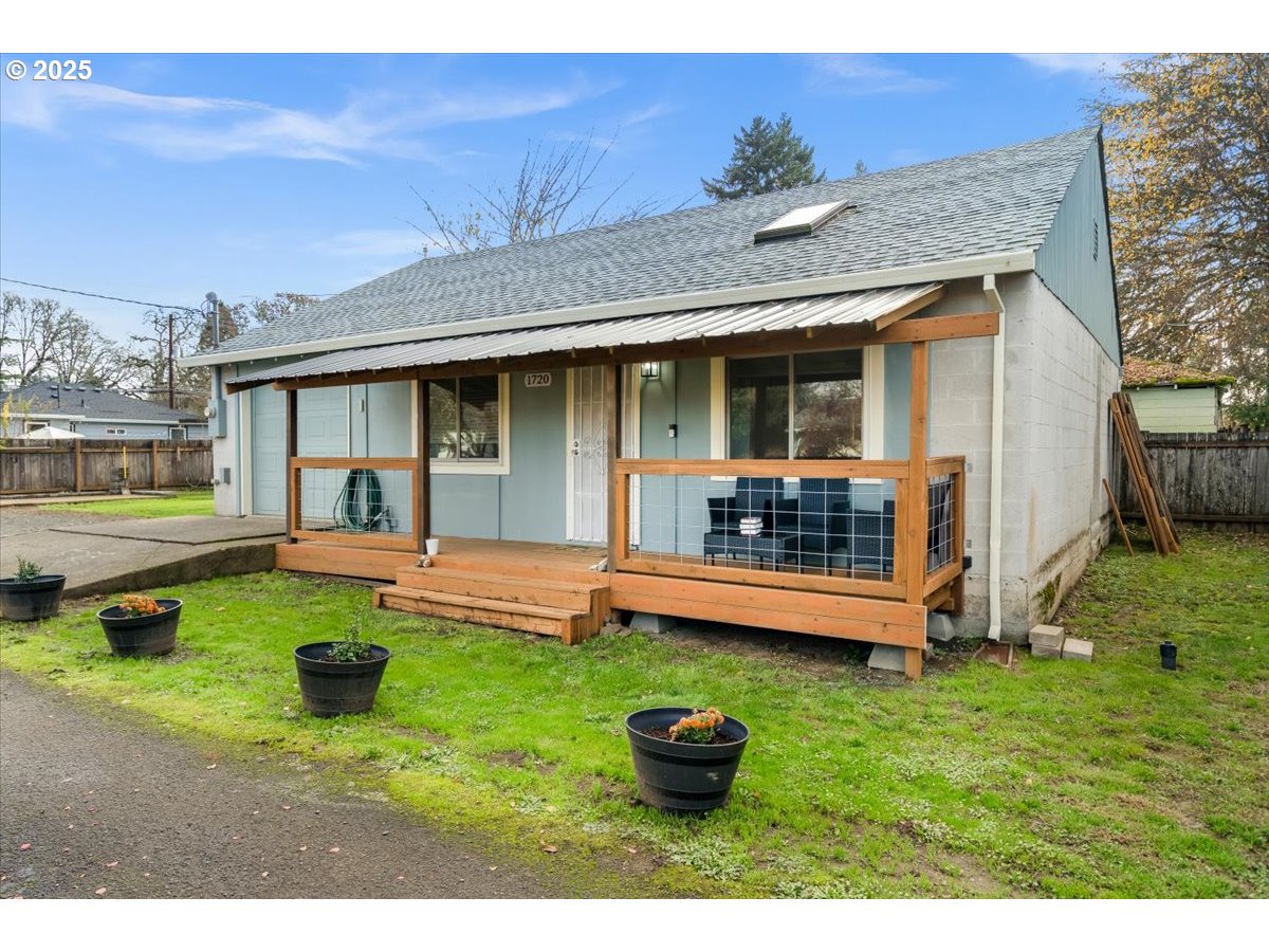 1720 B Street Forest Grove, OR 97116 - Photo 3 of 38 a view of a house with a backyard porch and sitting area