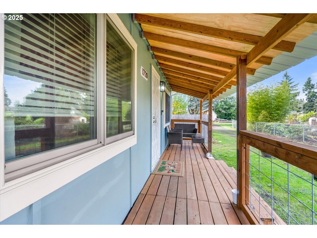 1720 B Street Forest Grove, OR 97116 - Photo 7 of 38 a view of backyard with a deck and wooden floor