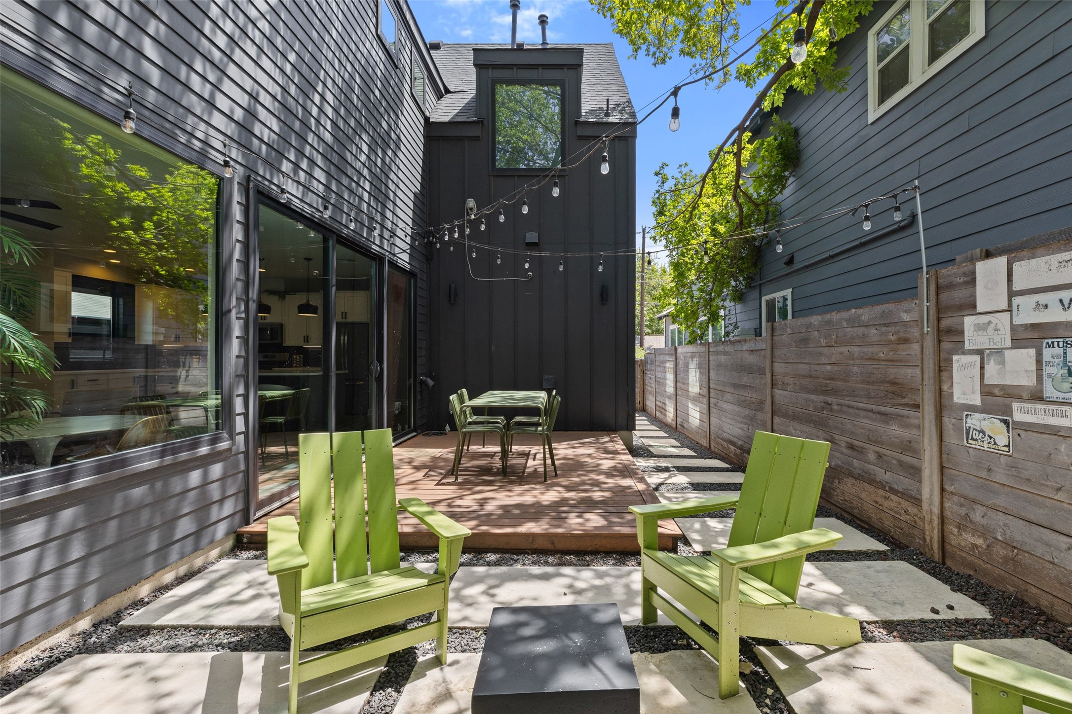 2202 Santa Rita Street Austin, TX 78702 - Photo 13 of 40 Private backyard with seating area, fire pit, and backyard deck