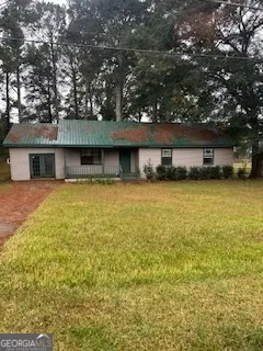 a view of a house with a swimming pool