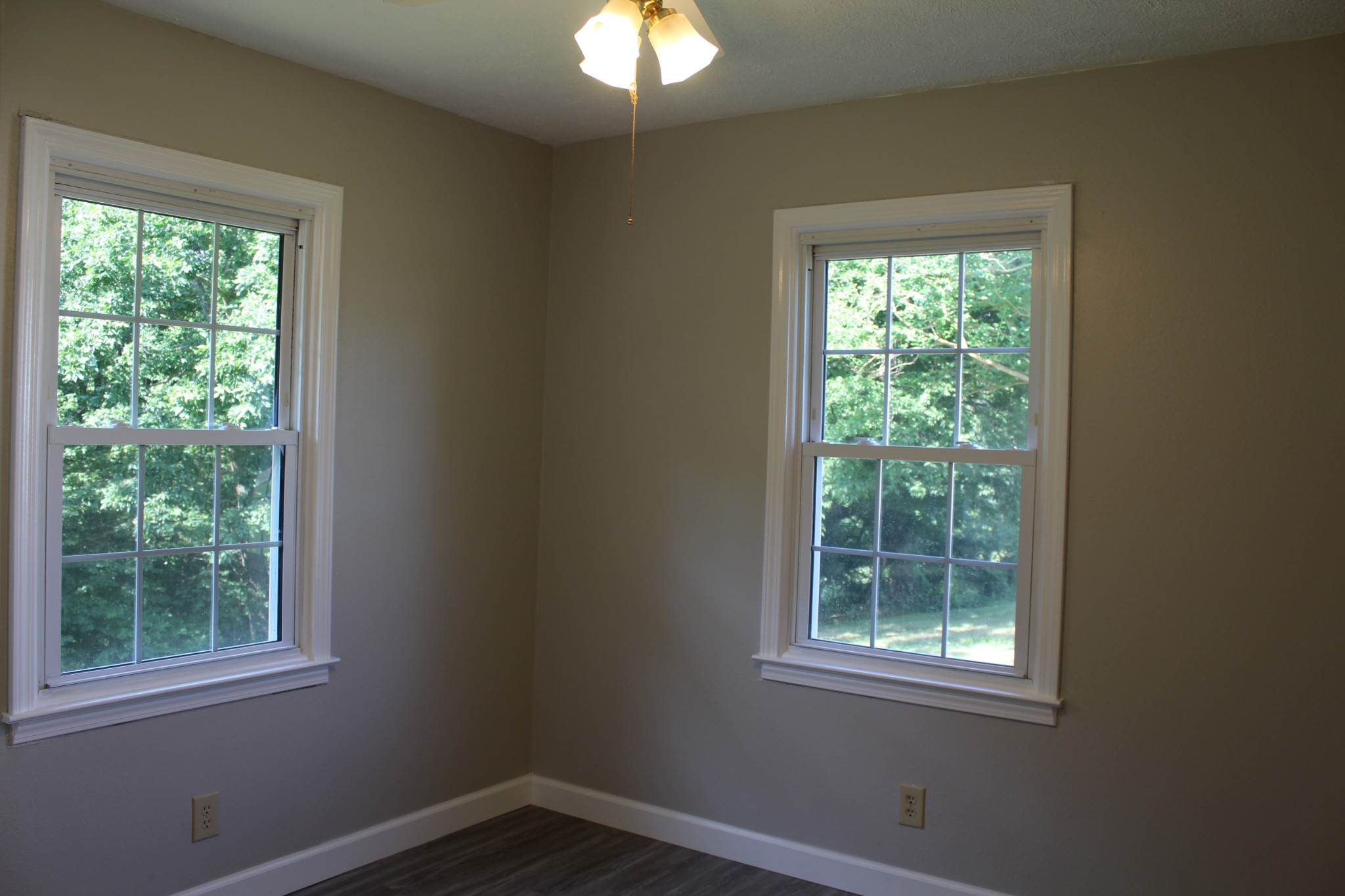 1275 Herman Adams Road Cumberland City, TN 37050 - Photo 11 of 25 an empty room with a window