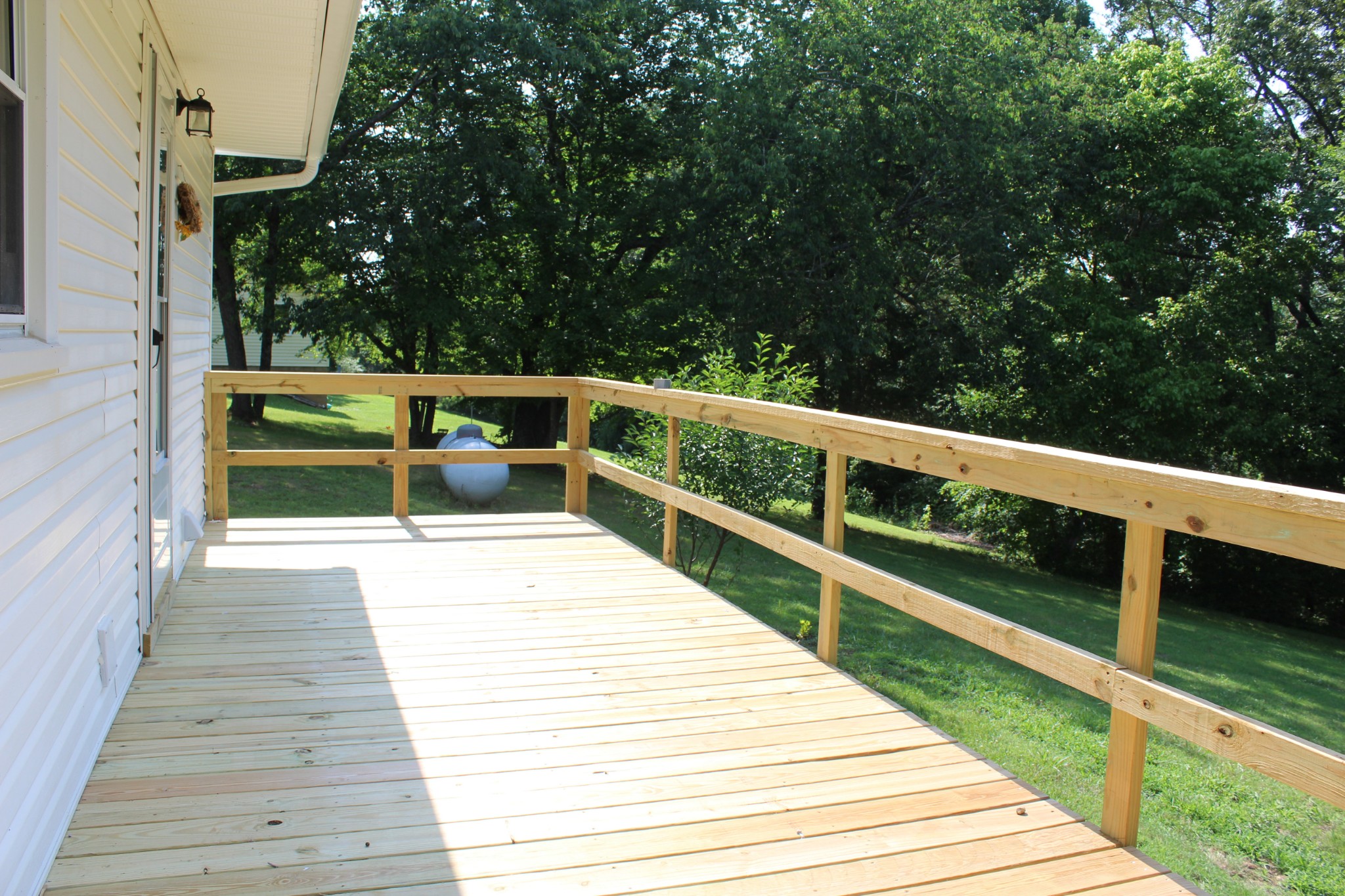 1275 Herman Adams Road Cumberland City, TN 37050 - Photo 17 of 25 a view of balcony with wooden floor and fence