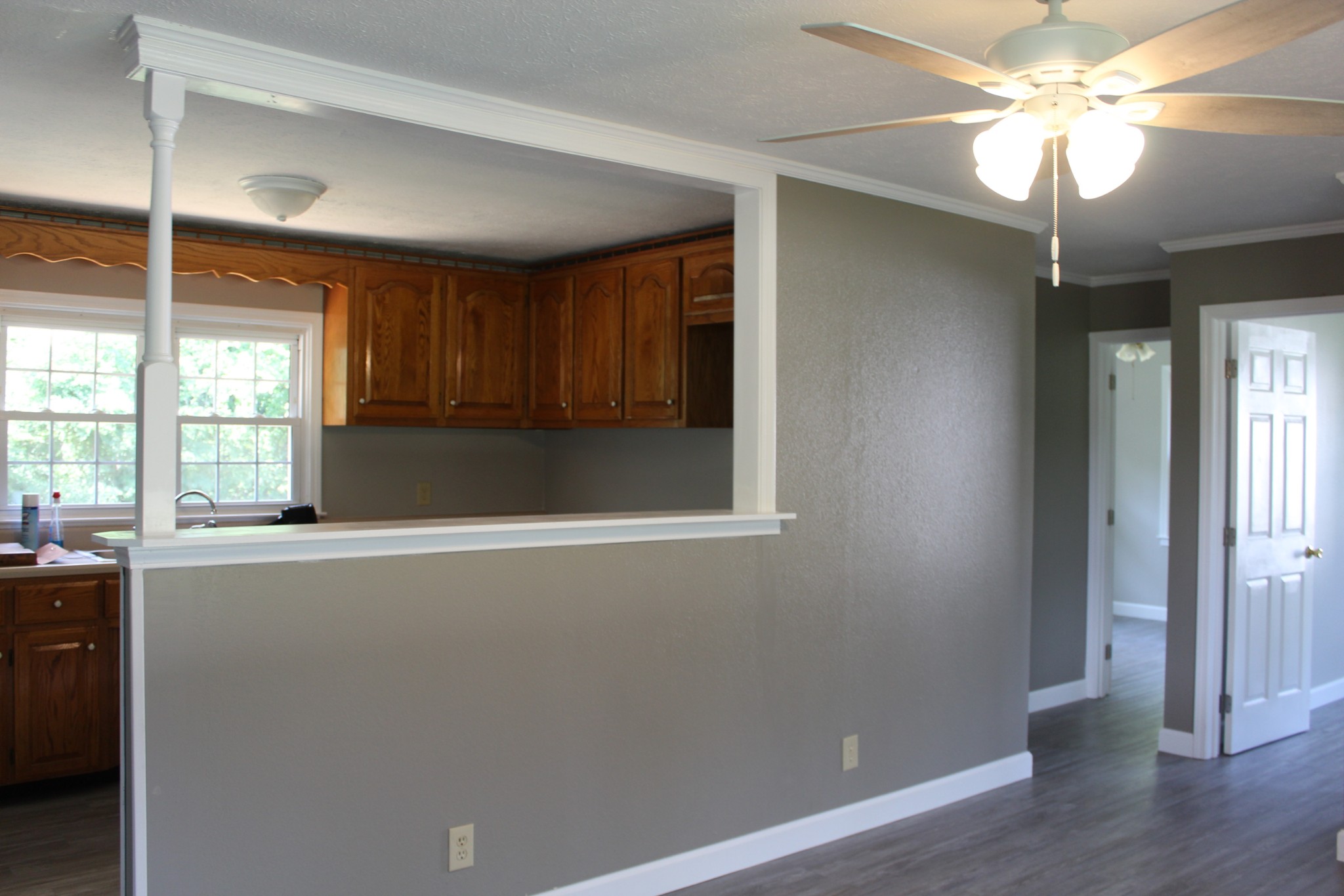 1275 Herman Adams Road Cumberland City, TN 37050 - Photo 8 of 25 a view of a livingroom with a ceiling fan and window