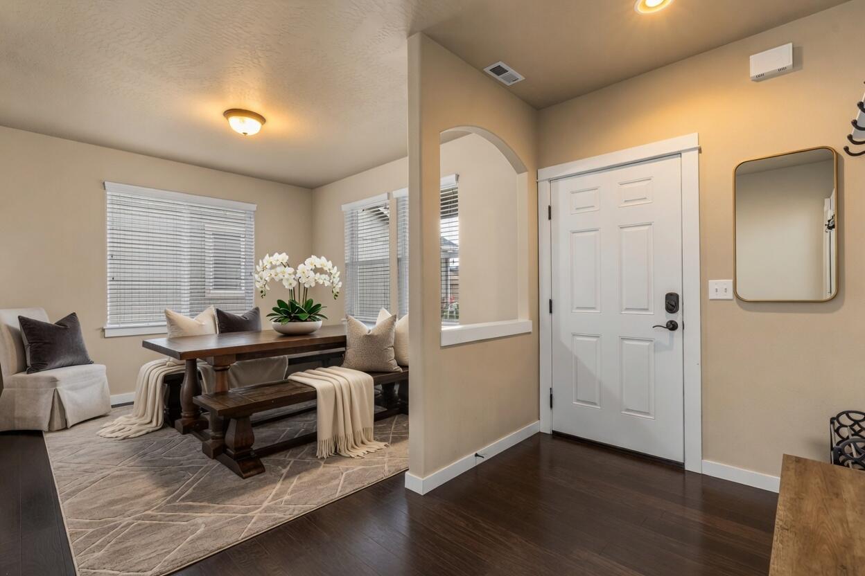 2781 Northeast Spring Water Place Bend, OR 97701 - Photo 6 of 23 a view of kitchen with furniture and wooden floor