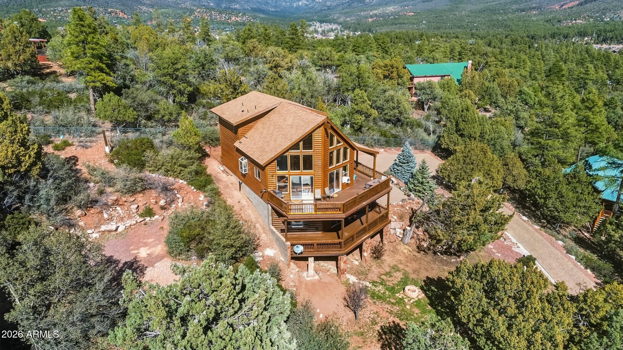 3119 Kysar Way Pine, AZ 85544 - Photo 43 of 68 an aerial view of a house with a yard