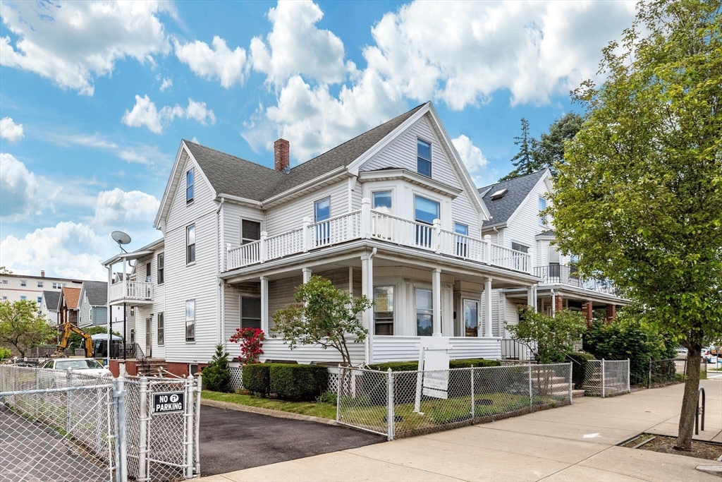 a front view of a house with a porch