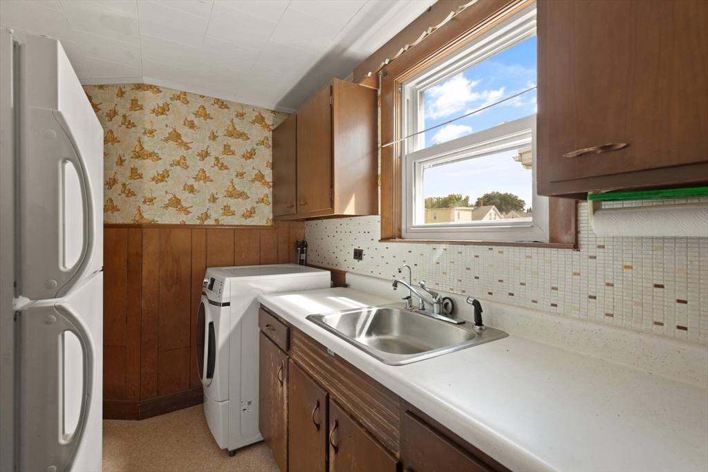 200 Broadway Somerville, MA 02145 - Photo 11 of 25 a view of a sink and a washer dryer