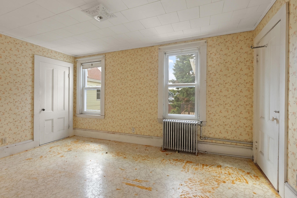 200 Broadway Somerville, MA 02145 - Photo 12 of 25 a view of an empty room with a window
