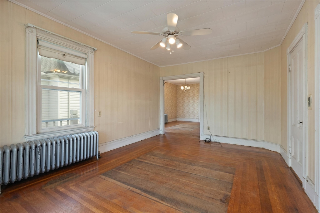 200 Broadway Somerville, MA 02145 - Photo 3 of 25 wooden floor in an empty room with a window