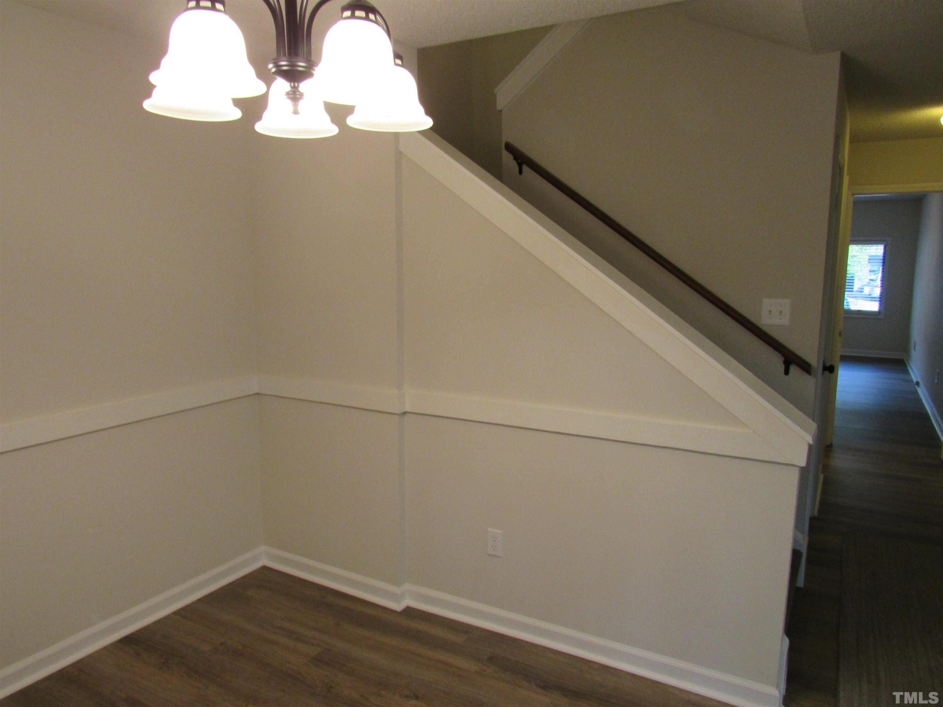 4309 Hunters Club Drive, Unit 4309 Raleigh, NC 27606 - Photo 23 of 35 a view of a small space with wooden floor