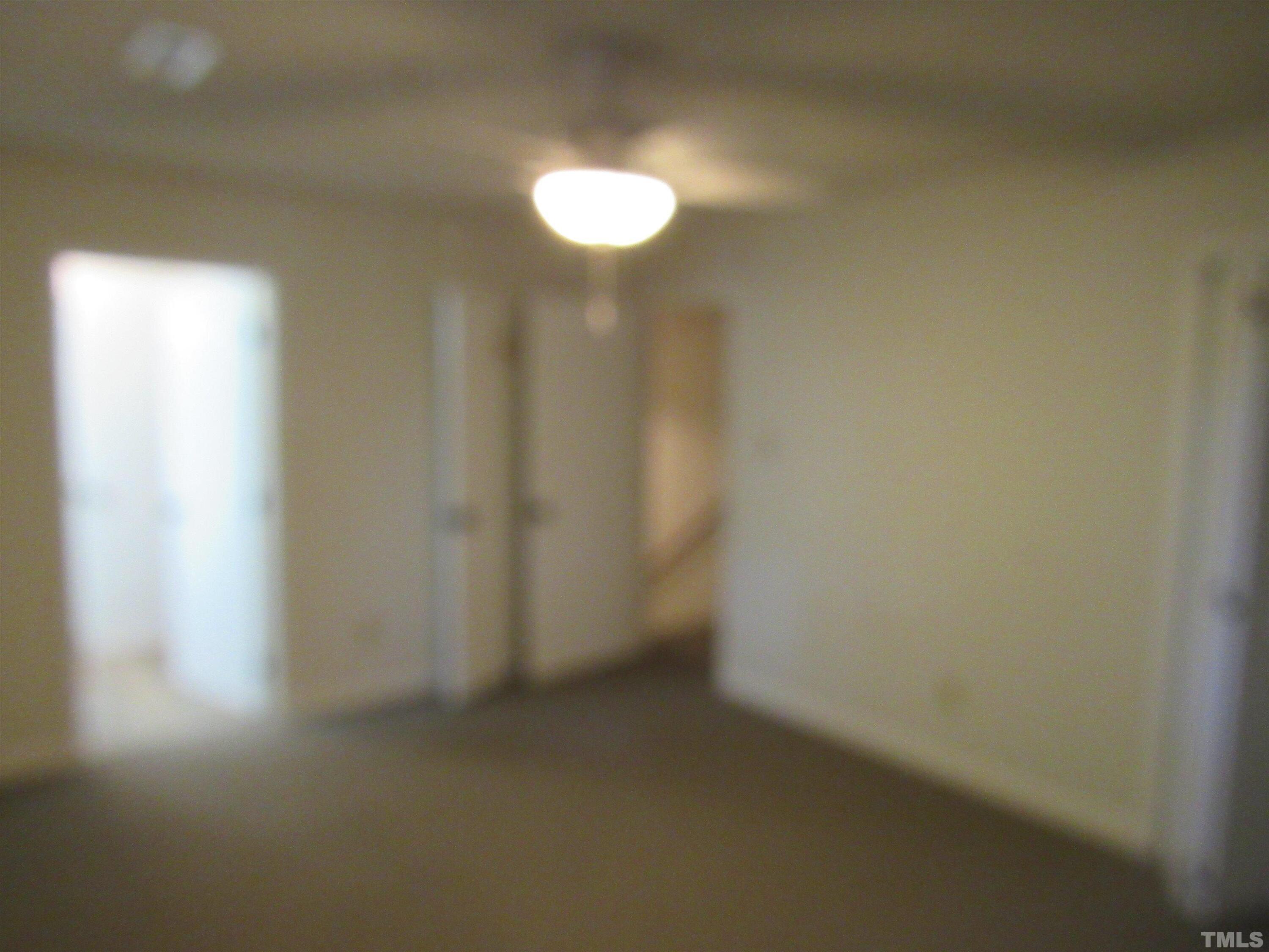 4309 Hunters Club Drive, Unit 4309 Raleigh, NC 27606 - Photo 27 of 35 a view of a small space with a window