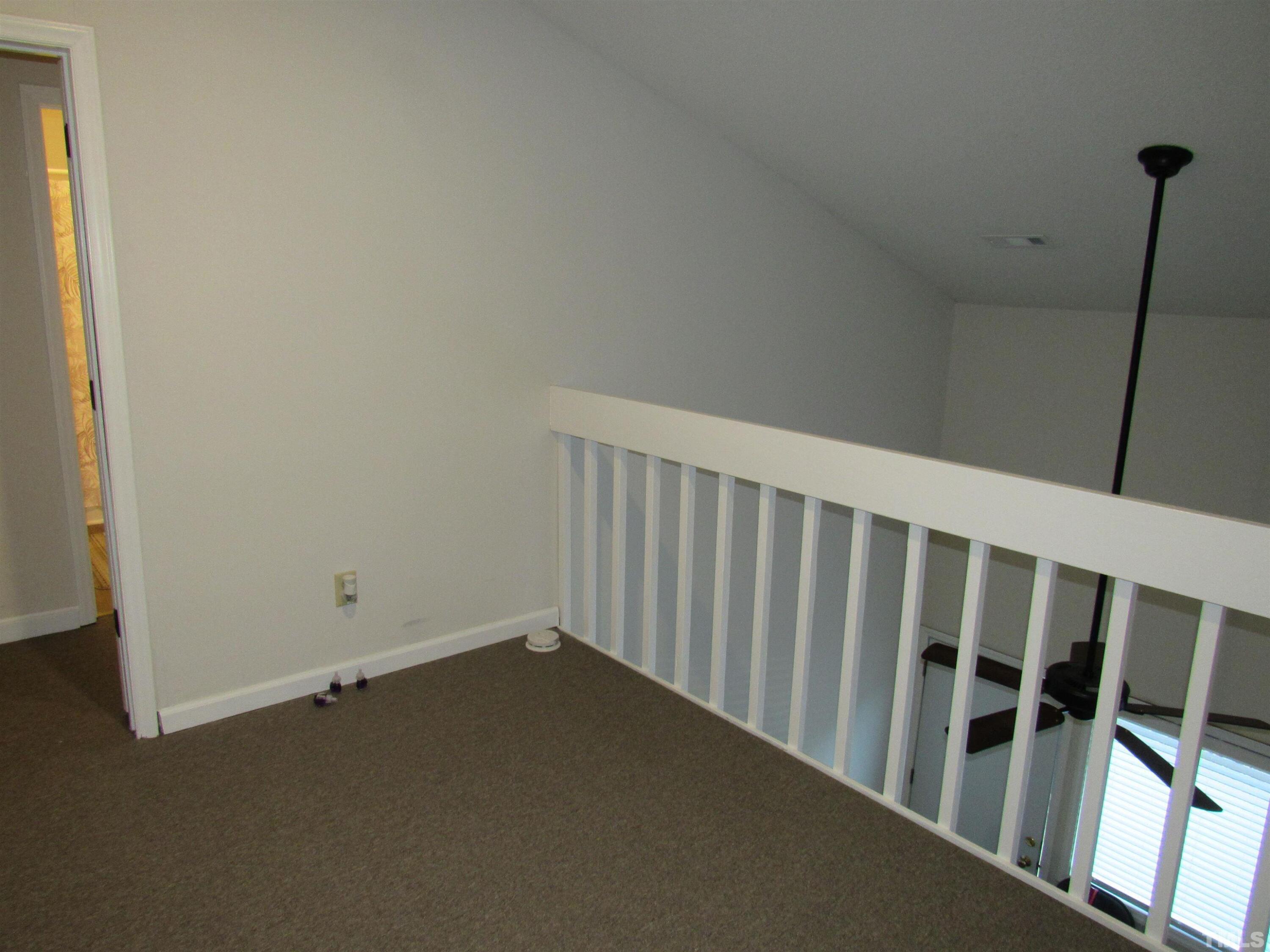 4309 Hunters Club Drive, Unit 4309 Raleigh, NC 27606 - Photo 34 of 35 a view of a hallway