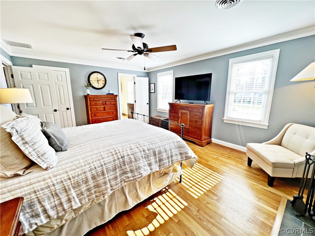 13330 West Salisbury Road Midlothian, VA 23113 - Photo 20 of 50 a bedroom with a bed and a flat screen tv