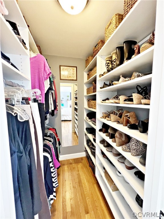 13330 West Salisbury Road Midlothian, VA 23113 - Photo 21 of 50 a view of walk in closet with clothes and shoes