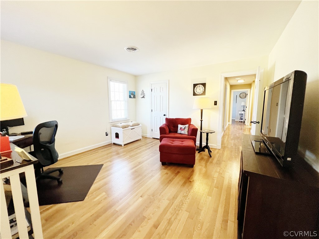 13330 West Salisbury Road Midlothian, VA 23113 - Photo 28 of 50 a living room with furniture and a flat screen tv